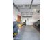 Spacious garage offering ample storage solutions, work space, and parking for a car at 24478 N 166Th Ave, Surprise, AZ 85387