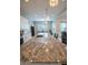 Kitchen island with granite countertop, sink, and pendant lighting at 24478 N 166Th Ave, Surprise, AZ 85387