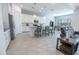 Open kitchen with white cabinets, stainless steel appliances, and a large island at 24478 N 166Th Ave, Surprise, AZ 85387