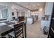 Inviting living space with open layout connecting the dining, kitchen and living rooms at 24478 N 166Th Ave, Surprise, AZ 85387