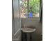 Bathroom features stand up sink with a large window to the backyard at 2719 N Greenfield Rd, Phoenix, AZ 85006