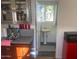 A compact half-bathroom, next to the kitchen, featuring a pedestal sink at 2719 N Greenfield Rd, Phoenix, AZ 85006