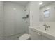 Modern bathroom featuring a tiled shower, updated fixtures, and a clean, functional design at 2719 N Greenfield Rd, Phoenix, AZ 85006