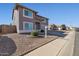 A two-story home featuring desert landscaping and visible 'for sale' sign on the front lawn at 3023 W Quail Ave, Phoenix, AZ 85027