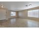 Inviting living room with tile flooring, neutral walls, and plenty of natural light at 3023 W Quail Ave, Phoenix, AZ 85027