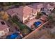 Aerial view of a backyard featuring a pool, a spa, and outdoor seating areas at 31816 N 19Th Ave, Phoenix, AZ 85085