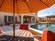 Outdoor living space with a large pool, lounge area, and outdoor seating at 31816 N 19Th Ave, Phoenix, AZ 85085