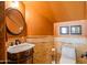 Elegant bathroom featuring granite countertops, decorative tile, and stylish fixtures, offering a luxurious and functional space at 31816 N 19Th Ave, Phoenix, AZ 85085