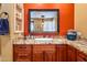 Stylish bathroom vanity with granite countertops, a vessel sink, and decorative mirror at 31816 N 19Th Ave, Phoenix, AZ 85085