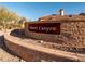 Desert Canyon community entrance sign with decorative brick wall at 31816 N 19Th Ave, Phoenix, AZ 85085