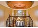 Grand foyer featuring a decorative chandelier, staircase, and a view of the front door at 31816 N 19Th Ave, Phoenix, AZ 85085