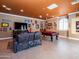 Fun game room including a pool table, a TV, and comfortable seating at 31816 N 19Th Ave, Phoenix, AZ 85085