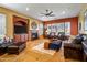 Spacious living room featuring a fireplace, tile flooring, and multiple seating areas at 31816 N 19Th Ave, Phoenix, AZ 85085