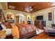 Spacious main bedroom with a fireplace, sitting area, and coffered ceiling at 31816 N 19Th Ave, Phoenix, AZ 85085