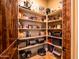 Walk-in pantry with organized shelving and ample storage space for kitchen essentials at 31816 N 19Th Ave, Phoenix, AZ 85085