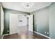 This bedroom features wood floors and a double door entry at 3311 W Baylor Ln, Chandler, AZ 85226