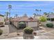 Charming single-story home featuring a red tile roof, attached two-car garage, and desert landscaping at 3311 W Baylor Ln, Chandler, AZ 85226