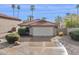 Charming single-story home with desert landscaping and a two-car garage at 3311 W Baylor Ln, Chandler, AZ 85226