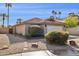 Beautiful home showcasing desert landscaping, a tile roof, and a well-maintained front yard at 3311 W Baylor Ln, Chandler, AZ 85226