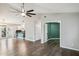 Spacious living room features wood floors, access to the kitchen, and a view of multiple rooms at 3311 W Baylor Ln, Chandler, AZ 85226