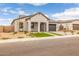 Charming single Gathering home with a two-car garage and a well-maintained yard at 34283 N Sandpiper Trl, Queen Creek, AZ 85144