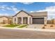 Picture of single Gathering home featuring an attached two car garage and landscaping at 34283 N Sandpiper Trl, Queen Creek, AZ 85144