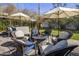 Backyard with a stone fire pit surrounded by chairs for outdoor gatherings at 4225 N 42Nd St, Phoenix, AZ 85018