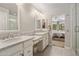 Bathroom featuring dual sinks, vanities, and a shower at 4225 N 42Nd St, Phoenix, AZ 85018