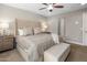 Bedroom featuring an upholstered bed, a bench, and an ensuite bathroom at 4225 N 42Nd St, Phoenix, AZ 85018