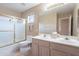 Bright bathroom featuring a shower-tub combo and double sink vanity at 4228 E Desert Sky Ct, Cave Creek, AZ 85331