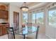 Cozy breakfast nook with a glass table, comfortable seating, and lots of natural light at 4228 E Desert Sky Ct, Cave Creek, AZ 85331