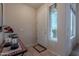 Inviting foyer with tile flooring, natural lighting, and a decorative table at 4228 E Desert Sky Ct, Cave Creek, AZ 85331