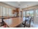 Open concept kitchen with stainless steel appliances, granite countertops, and a breakfast bar with seating at 4228 E Desert Sky Ct, Cave Creek, AZ 85331