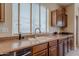 Close up of stainless steel kitchen sink and faucet with granite countertops at 4228 E Desert Sky Ct, Cave Creek, AZ 85331