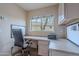 Home office with built-in desk and cabinets at 4228 E Desert Sky Ct, Cave Creek, AZ 85331