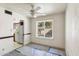 Dining area featuring a ceiling fan, a large window, and access to the kitchen at 4312 W Paradise Dr, Glendale, AZ 85304