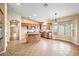 Gourmet eat-in kitchen with central island, stainless appliances, tile floors and dining area at 44025 N 44Th Ln, New River, AZ 85087