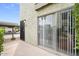 Private patio area with security door and access to the parking area at 4610 N 68Th St # 416, Scottsdale, AZ 85251