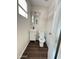 Cozy powder room featuring a modern sink, updated fixtures, and wood-look tile flooring at 5729 N 64Th Dr, Glendale, AZ 85301