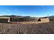 Estrella Crossing sign featuring desert landscaping and distant mountain views, promoting community charm at 5836 W Willow Ridge Dr, Laveen, AZ 85339