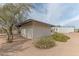 Exterior view of a backyard storage shed with desert landscaping and mature trees surrounding it at 5911 E Peak View E Rd, Cave Creek, AZ 85331