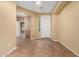 Inviting entryway with neutral paint and tile floors leading into the main living areas at 5948 W Leiber Pl, Glendale, AZ 85310