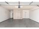 Spacious garage with ample storage cabinets and epoxy flooring at 6427 E Grandview Dr, Scottsdale, AZ 85254