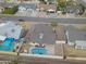 Aerial view of a single-Gathering home featuring a private swimming pool and desert landscaping for outdoor relaxation at 655 W Mission Dr, Chandler, AZ 85225