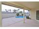 Relaxing covered patio with a view of the backyard pool and landscaping at 655 W Mission Dr, Chandler, AZ 85225