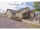 Charming home with desert-friendly landscaping, a walkway, and a blend of foliage for added curb appeal at 655 W Mission Dr, Chandler, AZ 85225