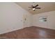 Main bedroom featuring hardwood floors and a large window for plenty of natural light at 655 W Mission Dr, Chandler, AZ 85225