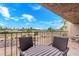 Comfortable balcony seating offers stunning views of the adjacent green space at 7428 N Via Camello Del Norte -- # 182, Scottsdale, AZ 85258