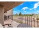 Relaxing balcony featuring comfortable seating with scenic views of the golf course and surrounding greenery at 7428 N Via Camello Del Norte -- # 182, Scottsdale, AZ 85258