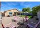 Cozy backyard with a gravel fire pit area, perfect for entertaining and relaxing outdoors at 853 E Ross Ave, Phoenix, AZ 85024